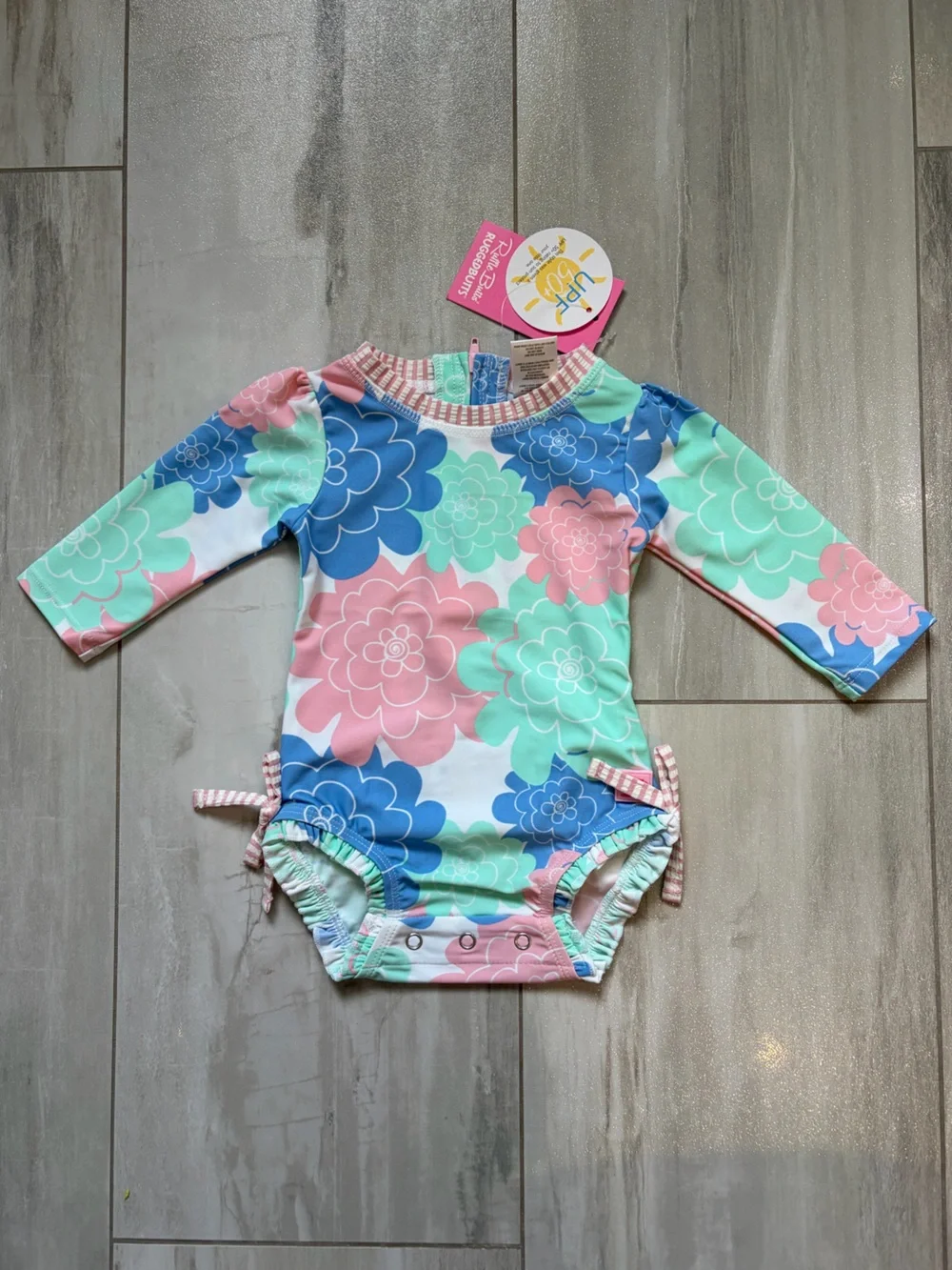 NWT RuffleButts Pastel Petals Long Sleeve RashGuard 1-piece Swimsuit Girls 3-6M